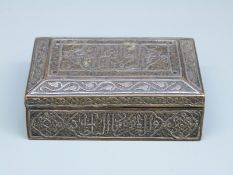 A 19thC white metal and brass hinged prayer box,