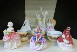 Royal Doulton figurines Sleeping Beauty, Annabel and Freedom, three Royal Doulton Seriesware cups,