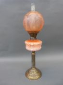 A Victorian brass and moulded glass oil lamp,