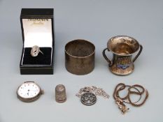 A hallmarked silver twin handled cup with enamel plaque,