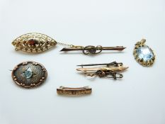 A 9ct gold brooch set with an amethyst, 9ct gold brooch (6.