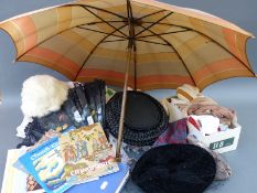 A group of linens to include embroidered items, gloves, stockings,