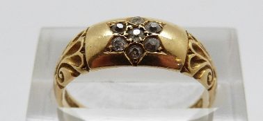 A Victorian 18ct gold ring set with diamonds in a star design, Birmingham 1898, size O, 4.