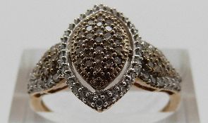 A 9ct gold ring set with diamonds in a cluster, size P, 3.