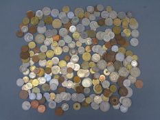 A large collection of world coinage comprising largely pre-euro 'holiday change' but also includes