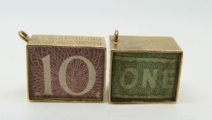 Two 9ct gold charms containing bank notes, 5.