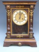 Continental late 19thC single train mahogany mantel clock, the Roman dial with beetle style hands,