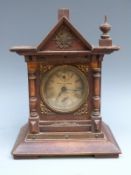 Pain Brothers, Hastings musical mantel clock in oak case, with carved and finialled decoration,