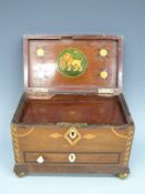 A Georgian mahogany two division tea caddy with shell inlay to lid,