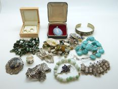 A large silver necklace in a Celtic design, silver, turquoise and pearl necklaces,