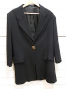 A black wool coat by Umberto Ginocchietti,