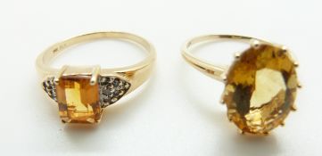 A 9ct gold ring set with an oval citrine and a 9ct gold ring set with a citrine and diamonds,
