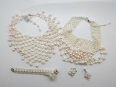 Two pearl necklaces/ chokers and pearl bracelet and earrings