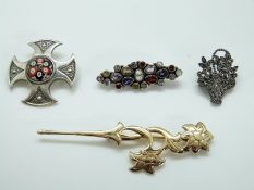 A silver gilt brooch in the form of a flower, silver brooch set with multi-coloured gemstones,
