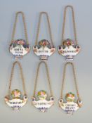 A set of six 19thC Dreyfous enamel bottle tickets comprising Burgundy, Rhine Wine, Cherry Brandy,