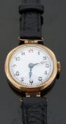 A British 9ct gold ladies wristwatch with Arabic numerals, blued Breguet hands, white emamel dial,