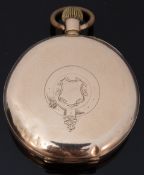 A 14k yellow metal cased gentleman's pocket watch with applied silver foliate decoration to dial
