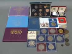 A collection of coins including decimal sets and year sets,