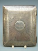 A George V Garrard hallmarked silver cigarette case with sunburst design, London 1913, length 8.