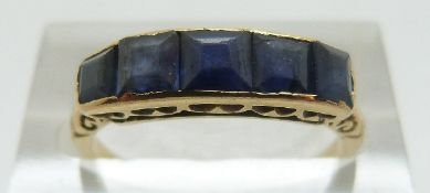 A 9ct gold Edwardian ring set with five square cut graduated sapphires, size M, 2.