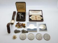 A cased 9ct gold and mother of pearl stud set, Timex watch,