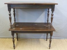 Two stained pine tables,