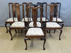 A set of eight Queen Anne style dining chairs
