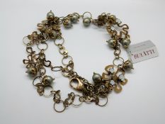 A Bulatti necklace in a floral design set with faux pearls and paste