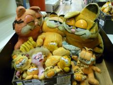 Three large Garfield soft toys together with a quantity of smaller and miniature examples including