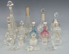 Thirteen hallmarked silver mounted dressing table bottles and one with indistinct marks,