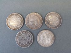 Five various shillings including George III, William III,
