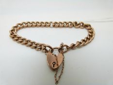 A 9ct rose gold curb link bracelet, 10.