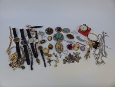A collection of costume jewellery including rings, brooches including Miracle and Mizpah,