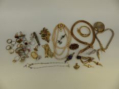 A collection of costume jewellery to include snake necklaces, two RAF brooches, rings,