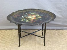 A 19thC papier maché table in the Betteridge style on aesthetic style faux bamboo base,