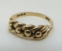 A 9ct gold keeper ring, 2.