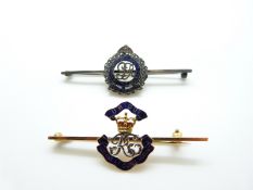 A 9ct gold Royal Engineers sweetheart brooch together with a similar white metal example in Garrard