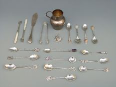 A Scottish hallmarked silver spoon, other silver spoons, silver and mother of pearl pickle forks,