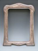A large modern hallmarked silver mounted photograph frame to suit 10 x 7 inch photograph,