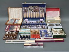 A large collection of cased and other silver plated cutlery including a six place setting canteen