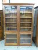 A glazed mahogany cupboard/bookcase,