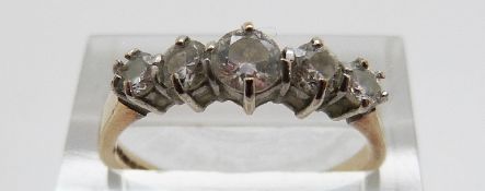 A 9ct gold ring set with five graduated cubic zirconia, size Q, 2.