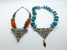 Two white metal Indian necklaces one with agate beads and one with turquoise
