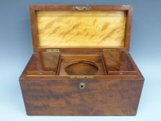 A mahogany tea caddy with Bramah type lock,