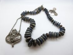 Two Indian white metal necklaces and a lapis lazuli necklace
