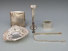 A Victorian hallmarked pierced bon bon dish, Chester 1895, bright cut Georgian silver sugar tongs,