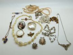 A collection of costume jewellery to include gold plated brooch, diamanté, marcasite,