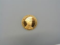 A 9ct gold Earl Mountbatten coin HMS Kelly reverse, with certificate, 5.