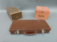 Vintage filing boxes and a small leather case
