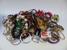 A collection of costume jewellery to include a pair of silver earrings, beads,